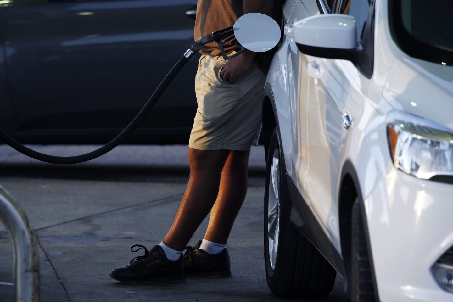 A customer refuels a vehicle at a Thornton's Inc. gas station in New Albany, Indiana, U.S., on Thursday, June 27, 2019. The national average for unleaded fuel is $2.72 a gallon, down 15 cents from last year's Fourth of July holiday. The lower prices are motivating a record number to hit the road, with 41.4 million commuters expected to travel by automobile, according to AAA. Photographer: Luke Sharrett/Bloomberg via Getty Images